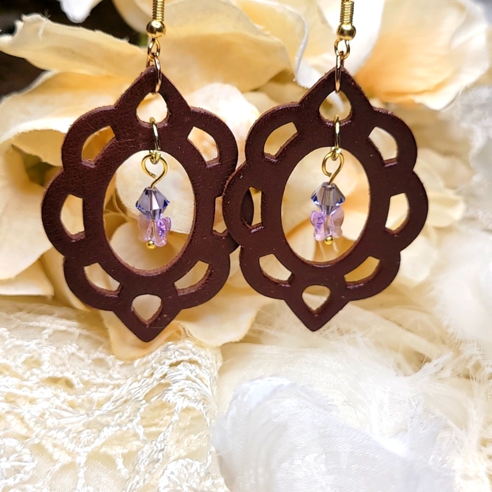 Purple Swarovski butterfly crystals with 18k gold plated hooks earrings